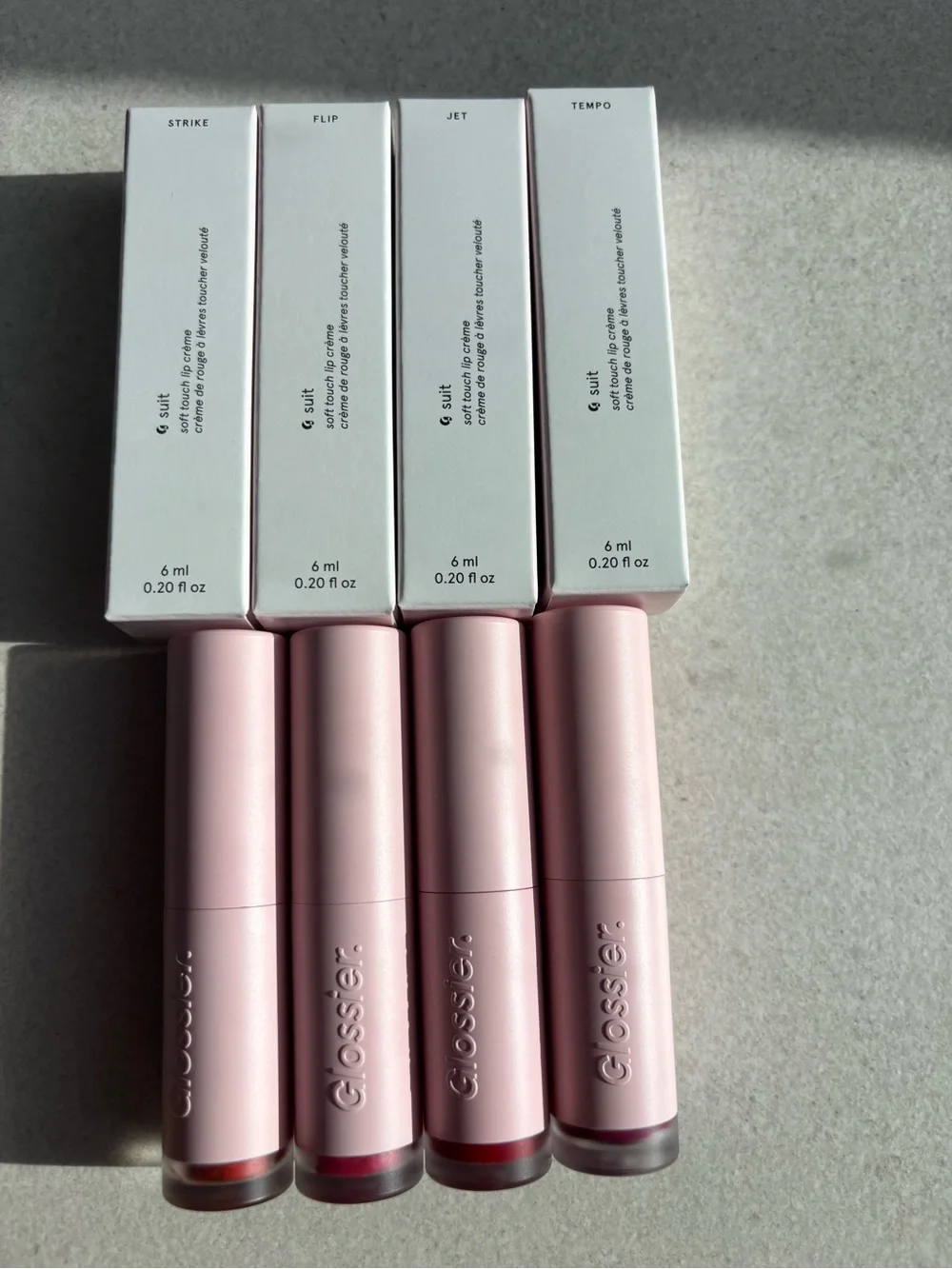 Glossier Soft Touch Lip Creme set of 4 Strike, Jet, Flip, Tempo